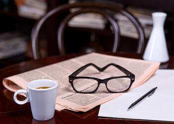 bigstock-Cup-Of-Coffee-And-Newspaper-72434437